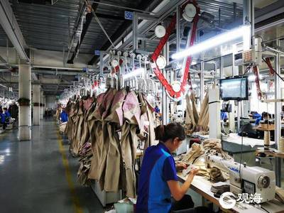 从量体到服装制版几秒钟就可搞定!青岛试水“犀牛智造工厂”